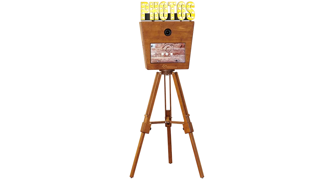 Vintage-Fotobox in Kameraform mit leuchtendem PHOTOS-Schriftzug